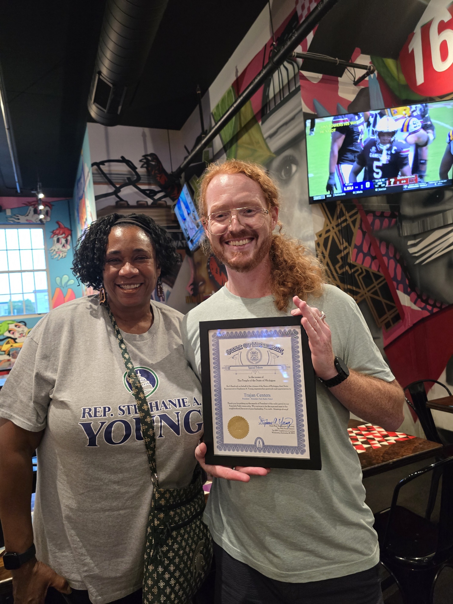 Trajan Centers receiving recognition from Michigan State Rep. Stephanie Young